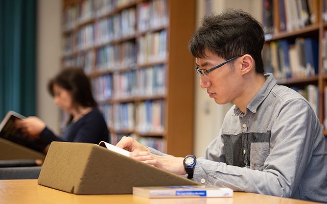 Students reading in the library