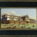 A large glass building with flags decorating the top. People sit on the grass outside it.