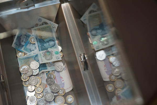 Donation box with money, Weston Library, Oxford