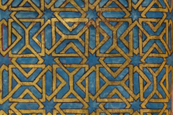 A blue and gold motif from a manuscript