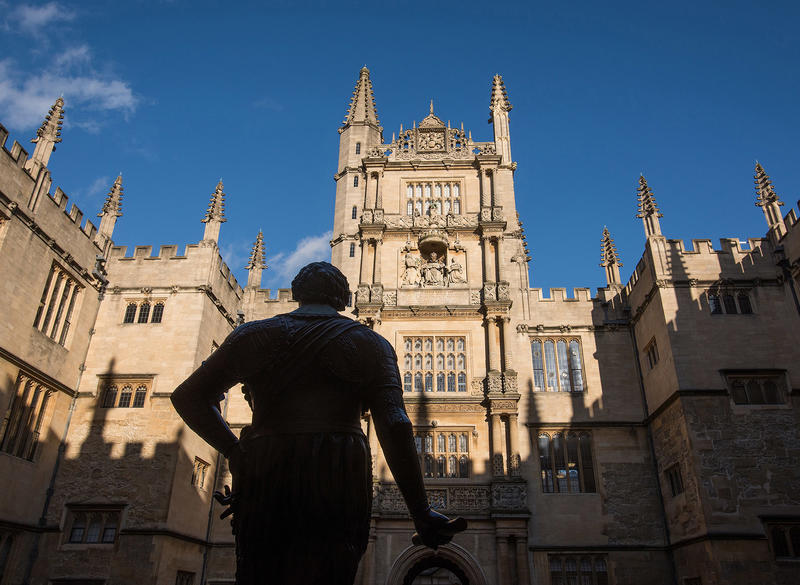 The quadrangle at the Bodleian Old Library with the statue of the Earl of Pembroke in the foreground